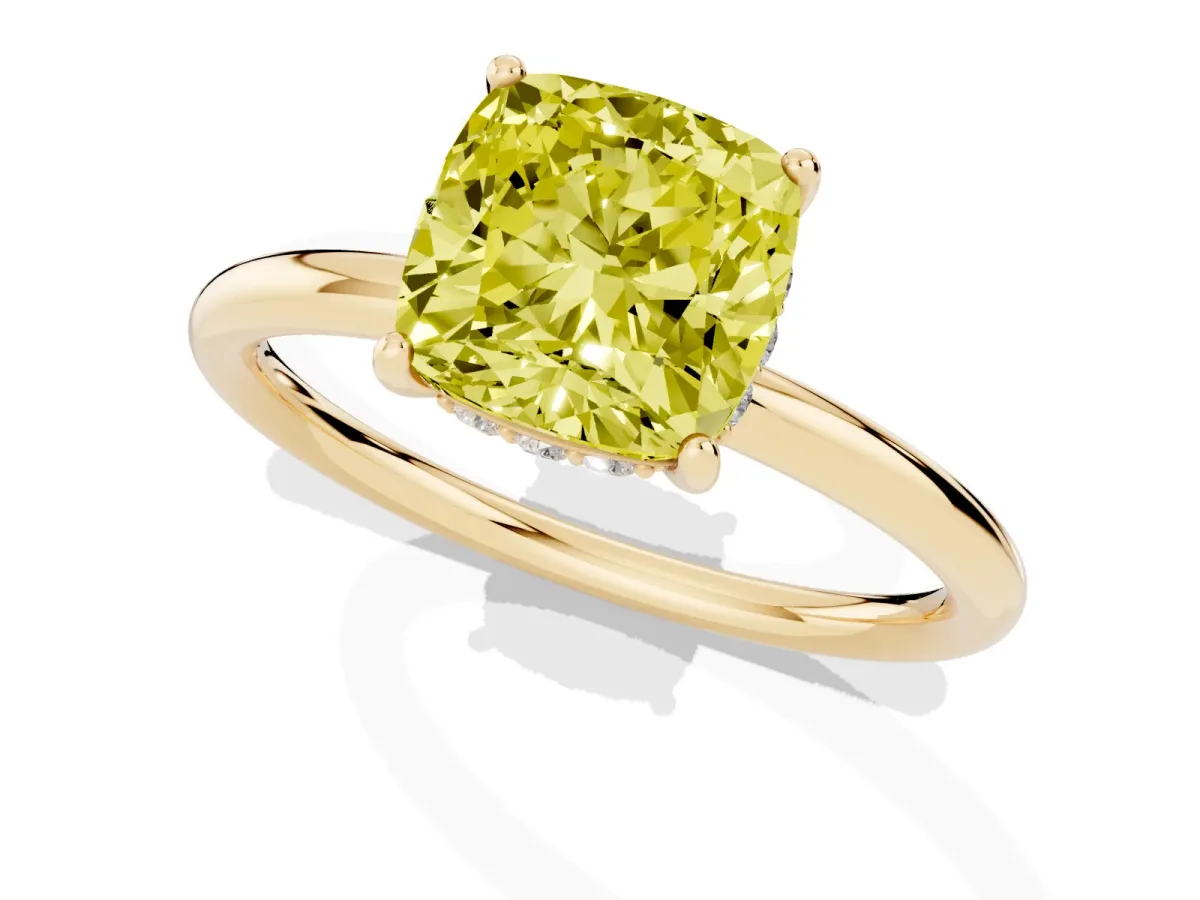 Fancy Yellow Cushion Cut Solitaire Diamond Ring with a Classic Band and Four-Prong Setting Yellow gold