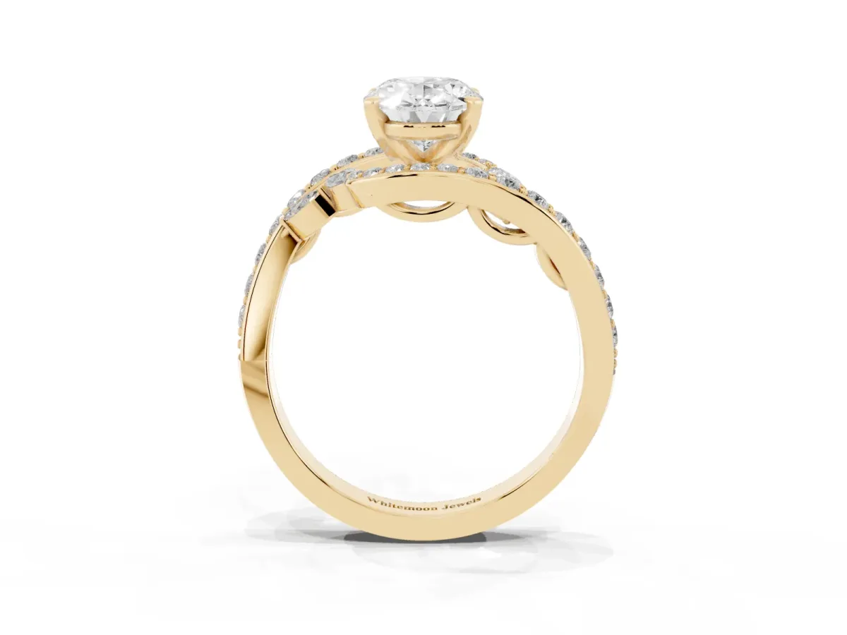 Oval Cut Solitaire with Pavé Twist Band and Four-Prong Setting Yellow gold