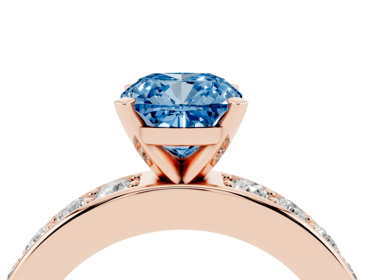 Fancy Blue Cushion Cut Diamond Engagement Ring with Channel Set Round Band and Prong Setting Rose gold