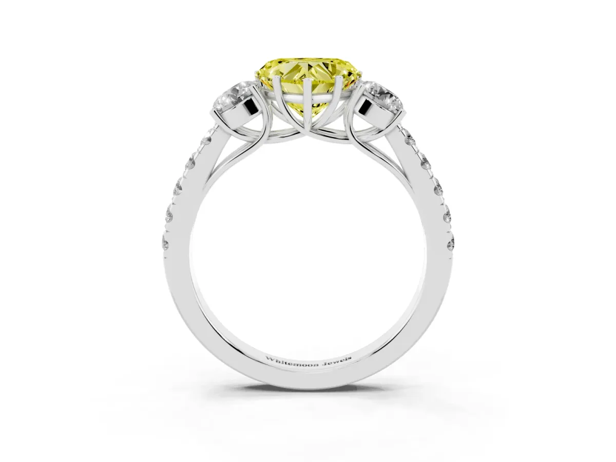 Fancy Yellow Heart Cut Cut Diamond Three-Stone Ring with Round Side Stones and Pavé Band Platinum