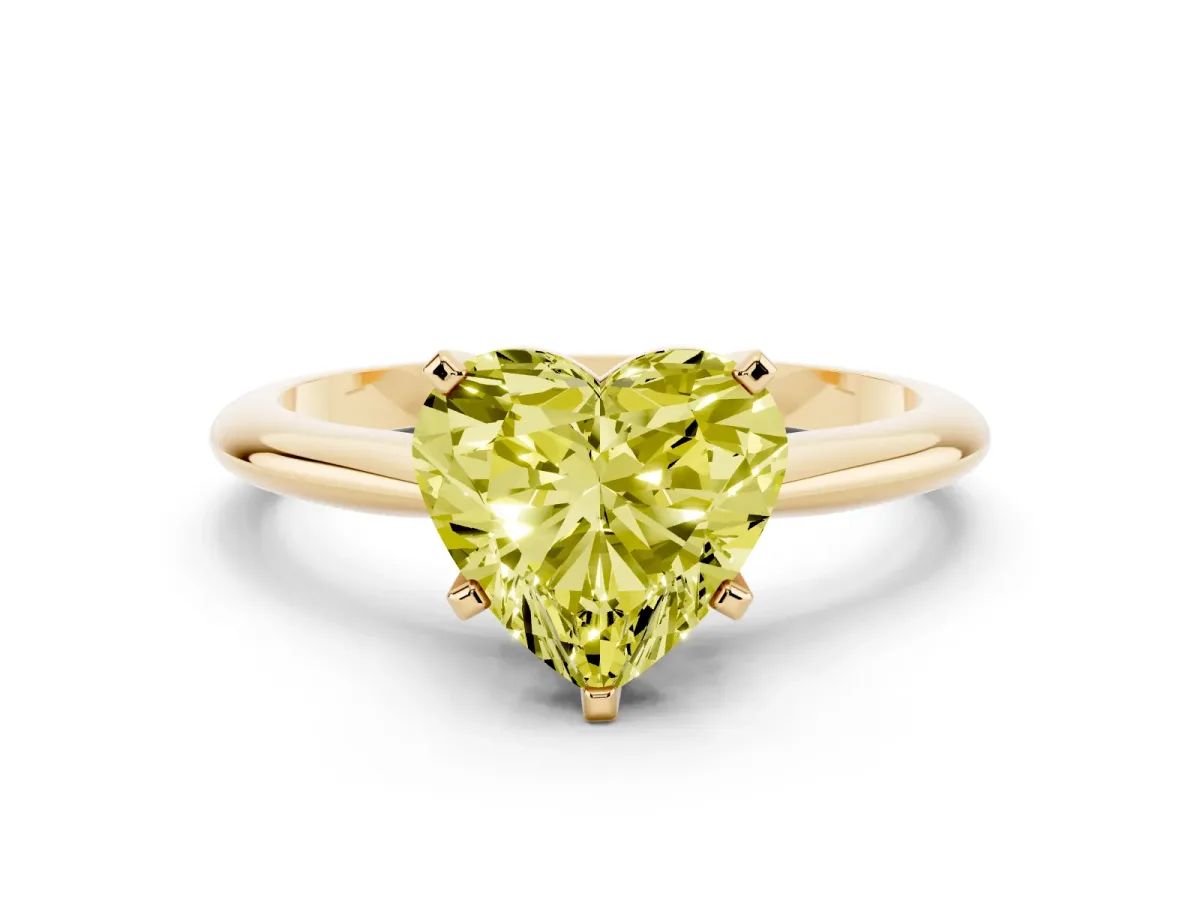 Fancy Yellow Heart Cut Cut Solitaire Ring with Four-Prong Setting on a Classic Band Yellow gold