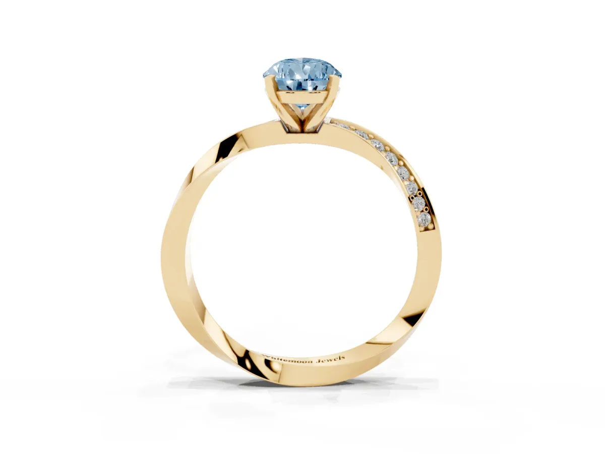 Fancy Blue Pear Cut Diamond Engagement Ring with Side Stone Accents and Four-Prong Setting Yellow gold