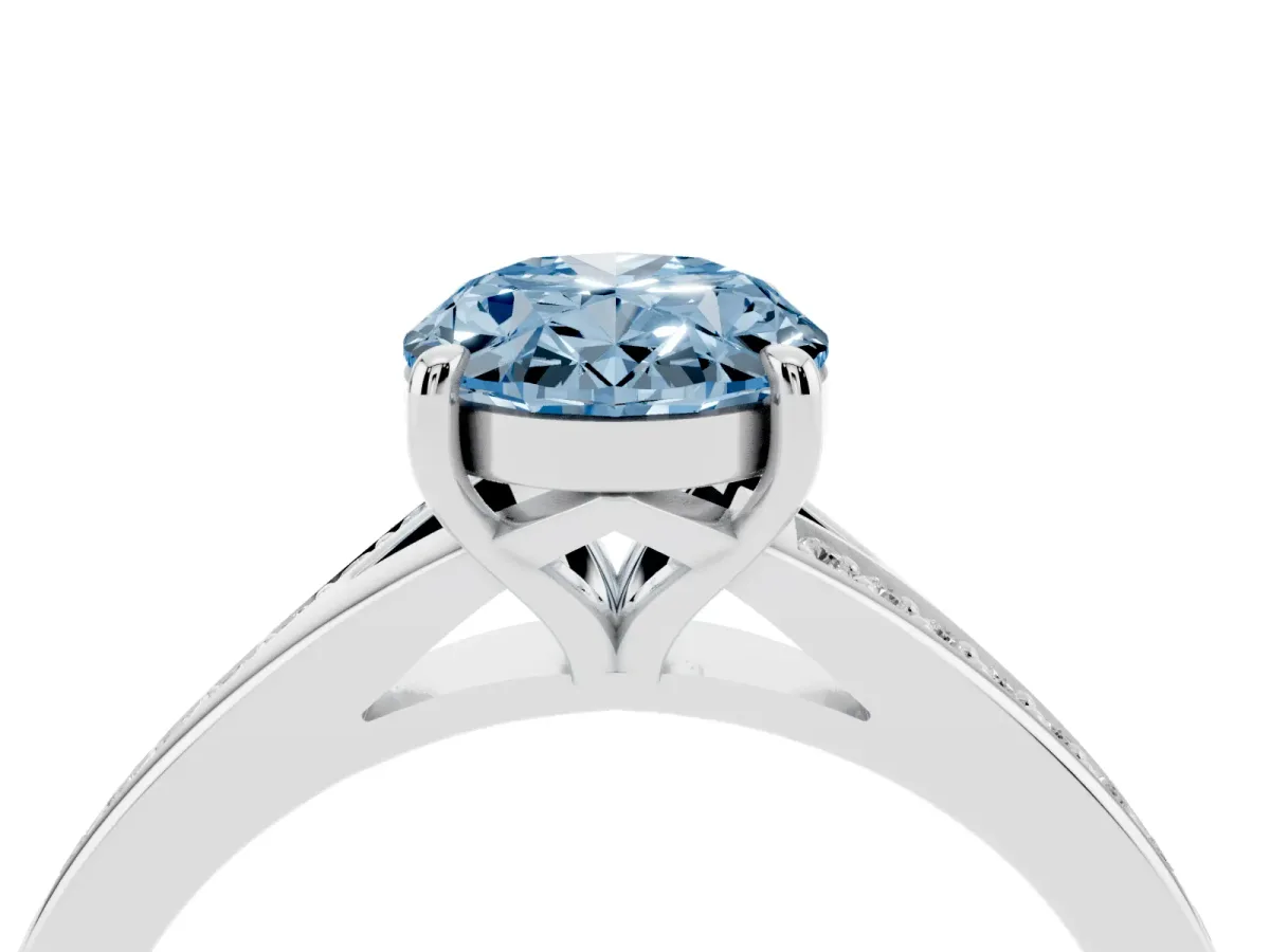 Fancy Blue Oval Cut Diamond Solitaire Ring with Pavé Band and Prong Setting Silver