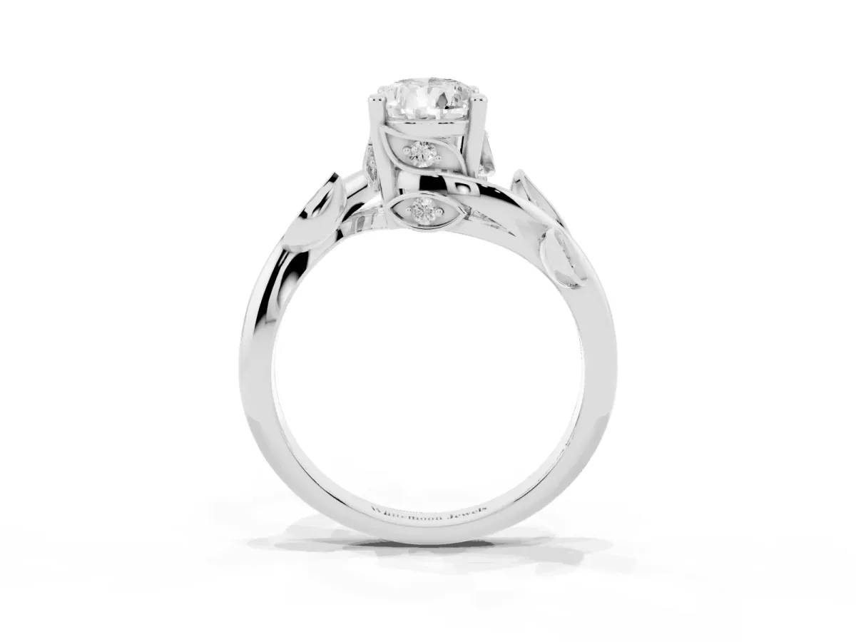 Pear Cut Solitaire Twist Engagement Ring with Leaf Accents and Prong Setting Silver