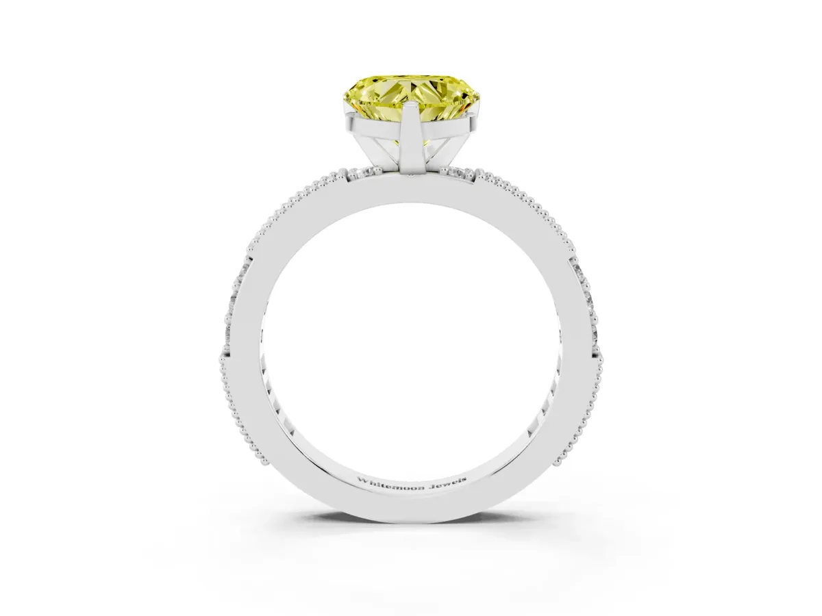 Fancy Yellow Heart Cut Solitaire with Pavé Band and Four-Prong Setting Silver