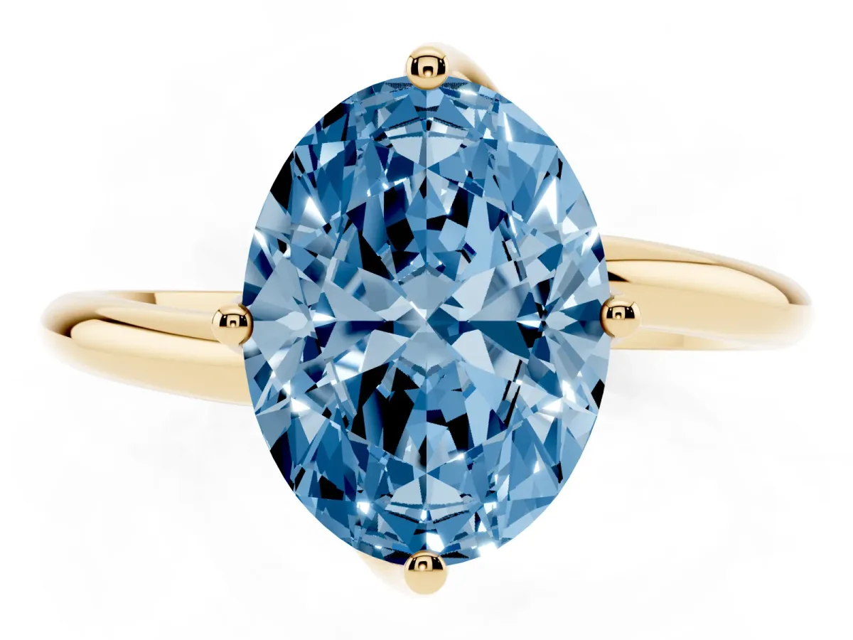 Fancy Blue Oval Cut Diamond Solitaire Engagement Ring with Four-Prong Setting and Classic Band Yellow gold