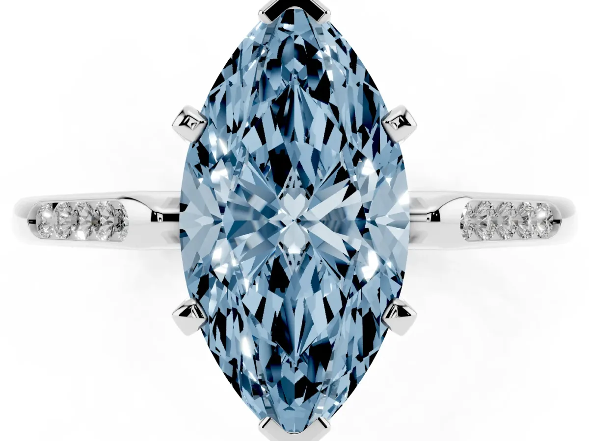 Fancy Blue Marquise Cut Diamond Solitaire Ring with Channel Set Round Band and Prong Setting Silver