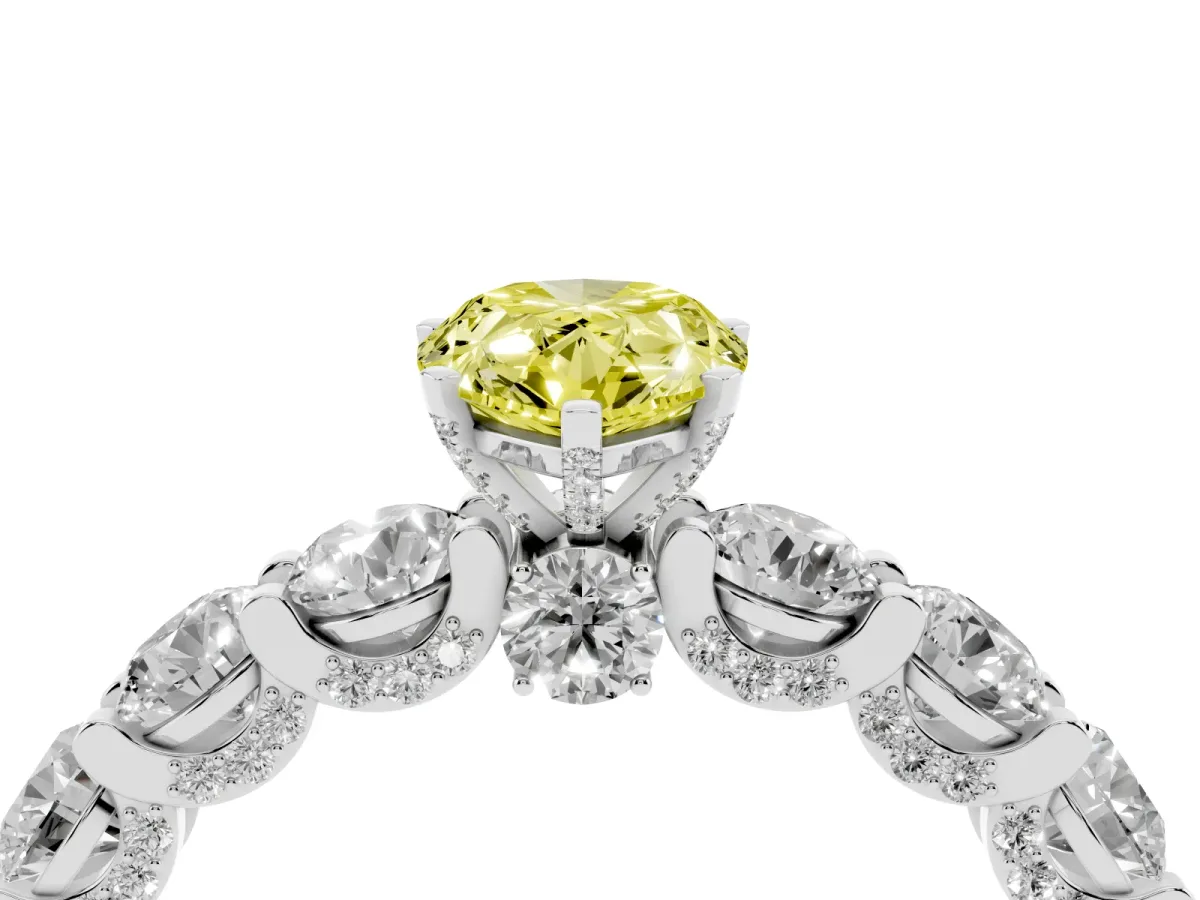 Fancy Yellow Pear Cut Diamond Side Stone Engagement Ring with Four-Prong Setting White gold