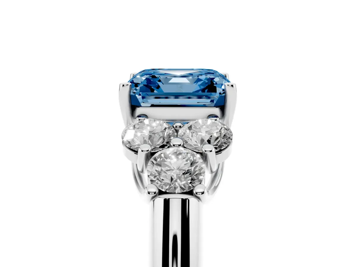 Fancy Blue Asscher Cut Cut Diamond Cluster Ring with Round Accent Stones and Prong Setting on a Classic Band White gold