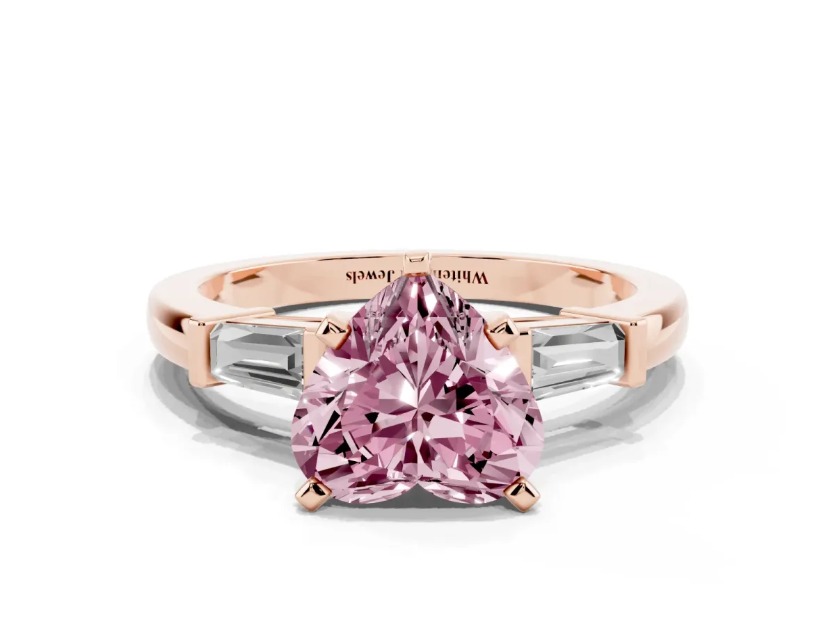 Fancy Pink Heart Cut Cut Diamond Solitaire Ring with Tapered Baguette Accents and Four-Prong Setting Rose gold