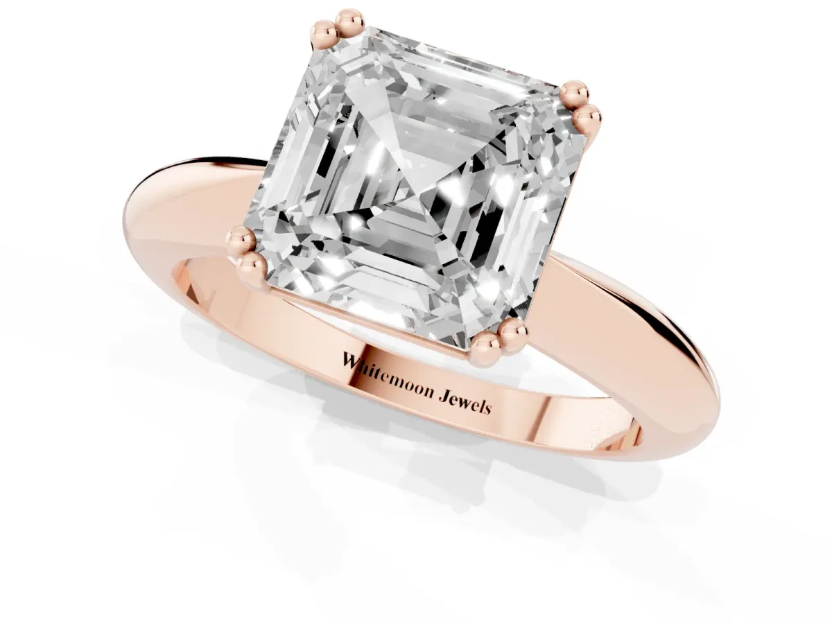 Asscher Cut Cut Solitaire Engagement Ring with Tapered Band and Four-Prong Setting Rose gold