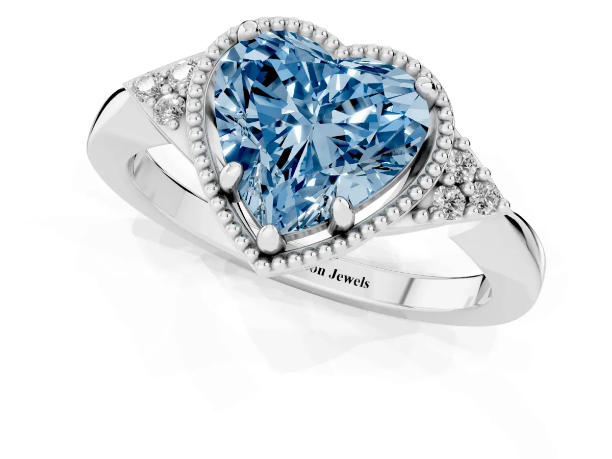 Fancy Blue Heart Cut Diamond Halo Ring with Tapered Band and Four-Prong Setting Platinum