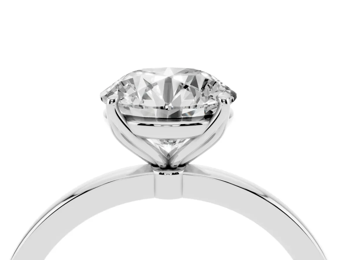Round Cut Diamond Solitaire Ring with Thin Band and Prong Setting Platinum