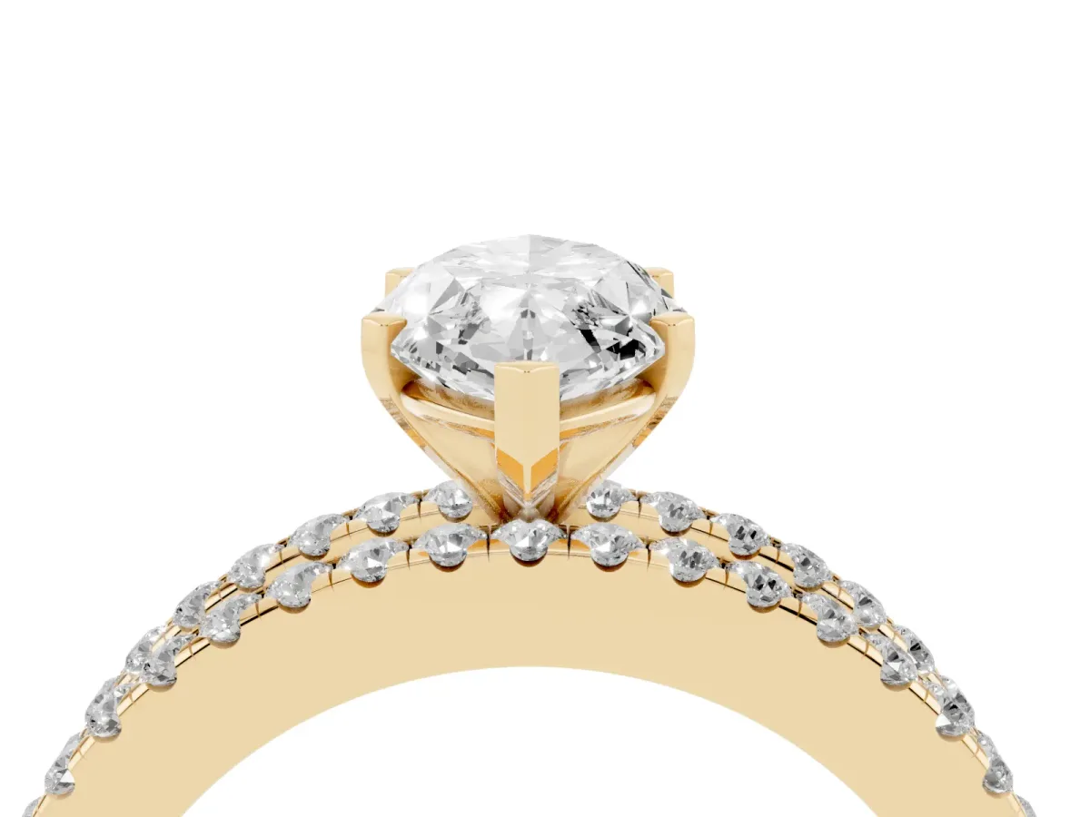 Marquise Cut Diamond Solitaire Ring with Pavé and Channel Set Band Yellow gold