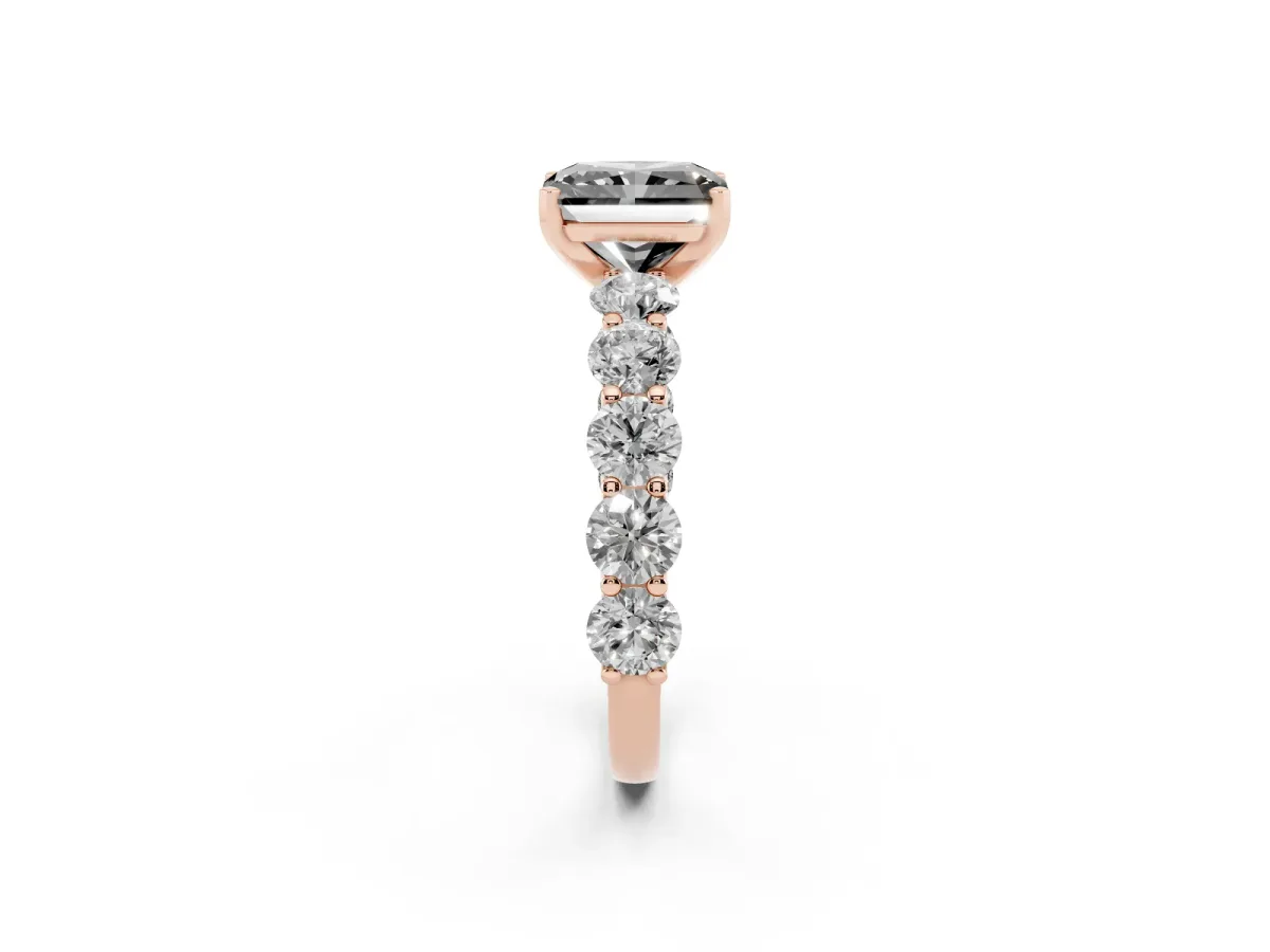 Fancy Black Radiant Cut Diamond Prong Setting with Side Stones on a Pave Band Rose gold