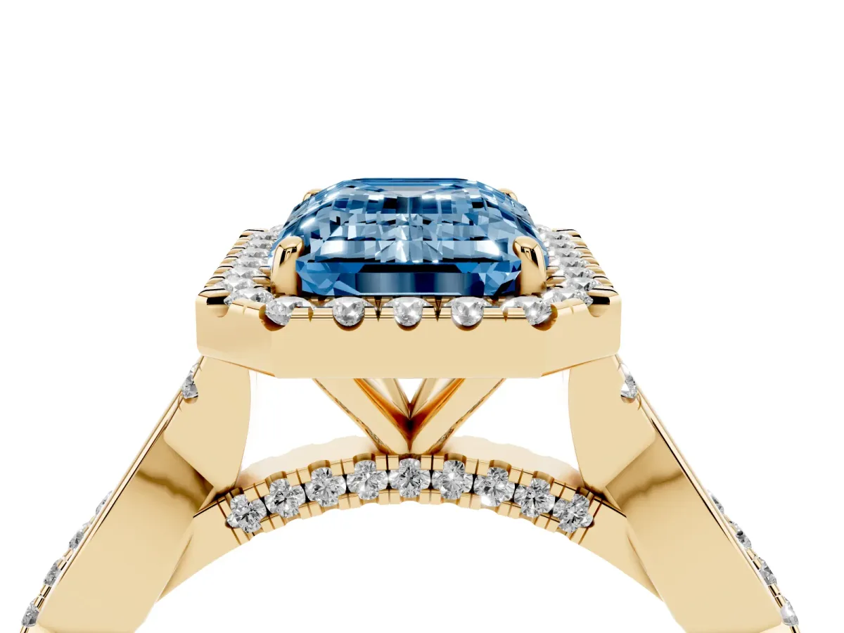 Fancy Blue Emerald Cut Halo Twist Band Solitaire Ring Yellow gold