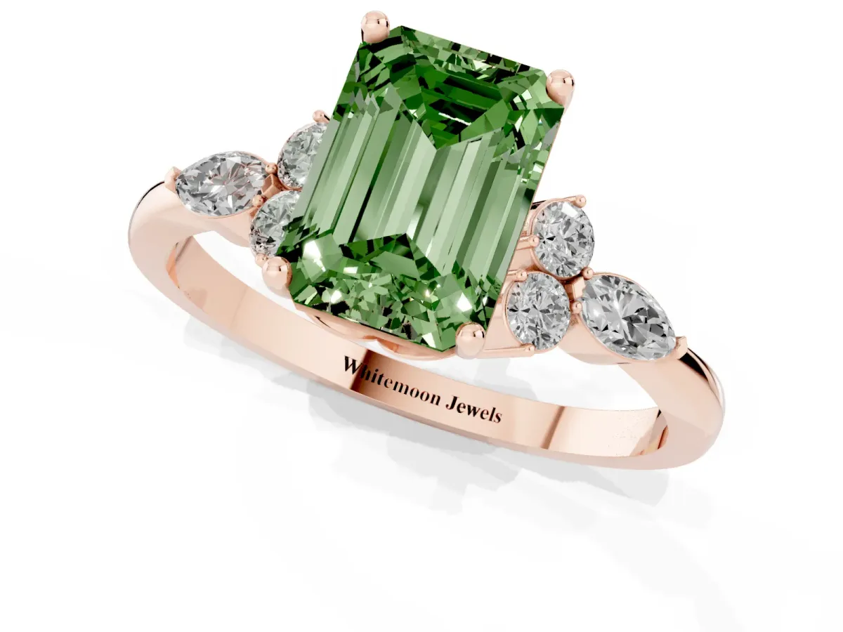 Fancy Green Emerald Cut Brilliant Diamond Solitaire Ring with Pear Side Stones and Four-Prong Setting Rose gold