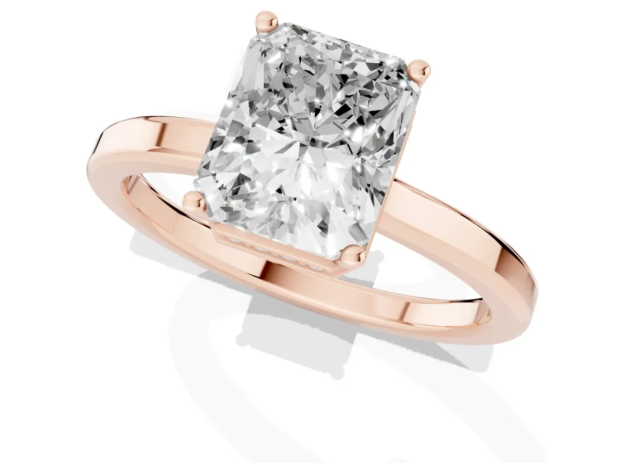 Radiant Cut Cut Solitaire Engagement Ring with Four-Prong Setting on a Classic Band Rose gold