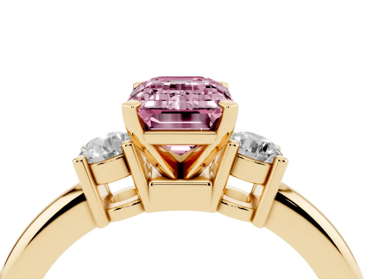 Fancy Pink Three-Stone Emerald Cut Cut Diamond Solitaire with Prong Setting and Classic Band Yellow gold