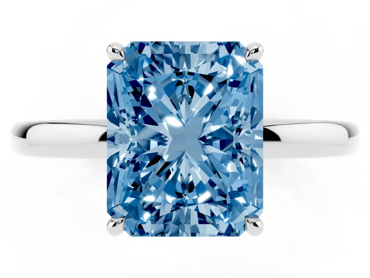 Fancy Blue Radiant Cut Solitaire Engagement Ring with Cathedral Band and Four-Prong Setting Silver