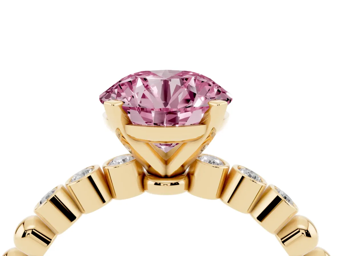 Fancy Pink Round Cut Solitaire Bezel Accent Diamond Engagement Ring with Beaded Band and Four-Prong Setting Yellow gold