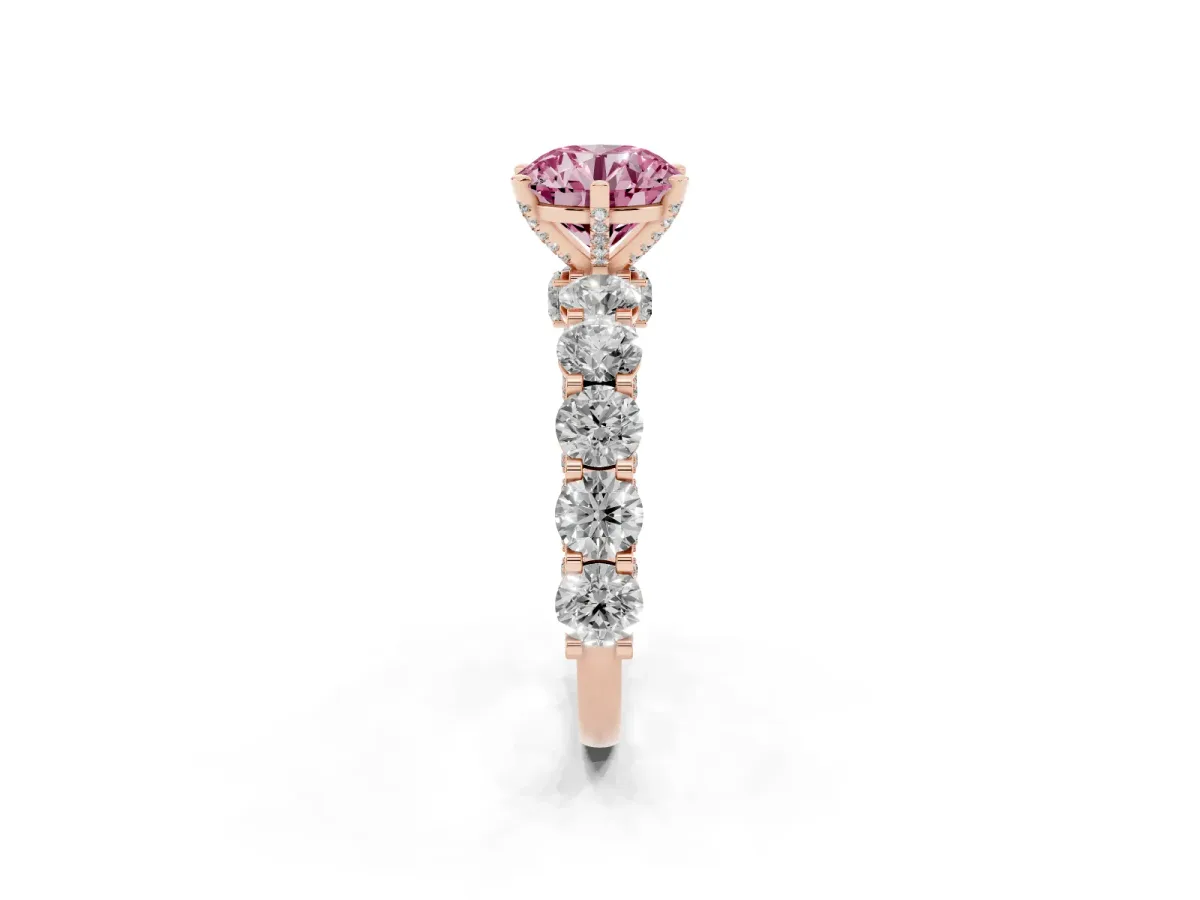 Fancy Pink Round Cut Diamond Side Stone Engagement Ring with Four-Prong Setting Rose gold