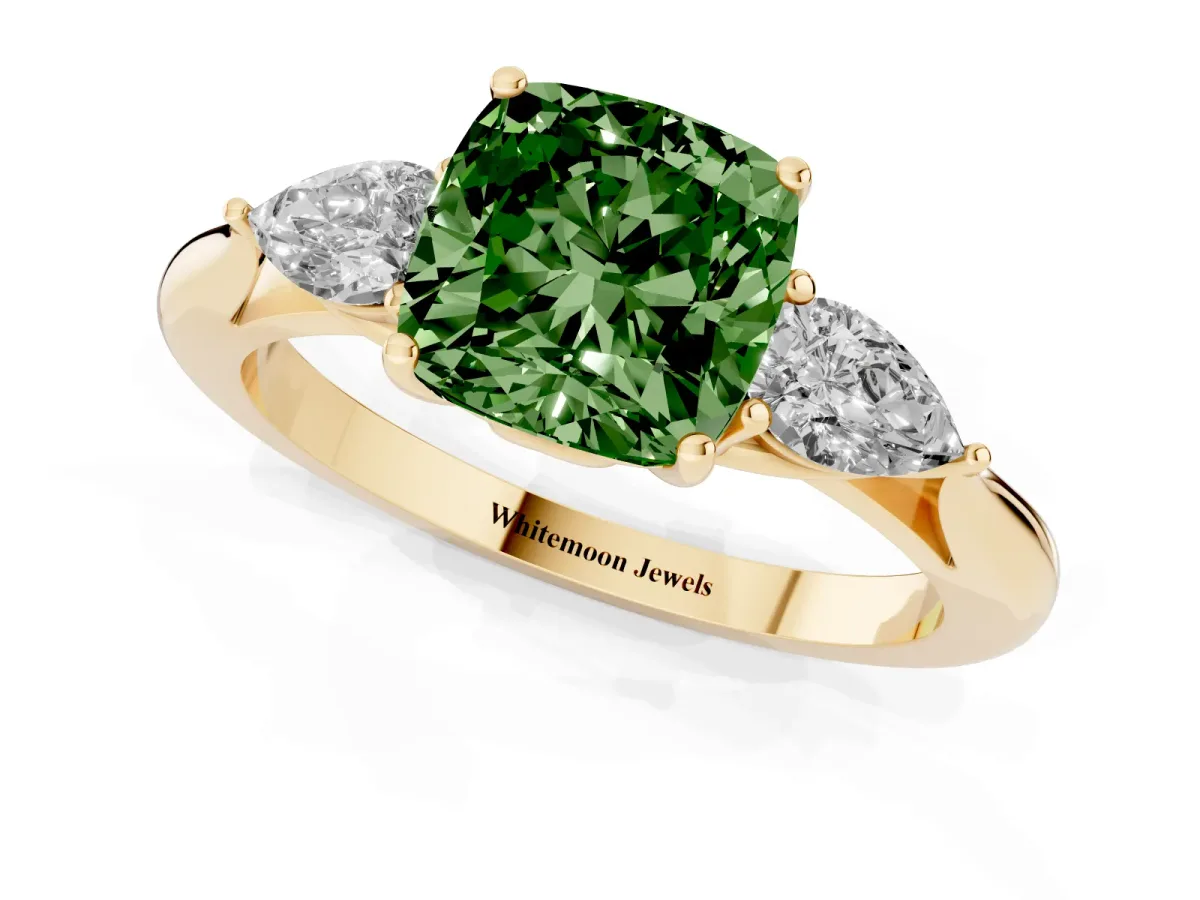 Fancy Green Three-Stone Cushion Cut Diamond Ring with Pear Side Stones in Four-Prong Setting Yellow gold