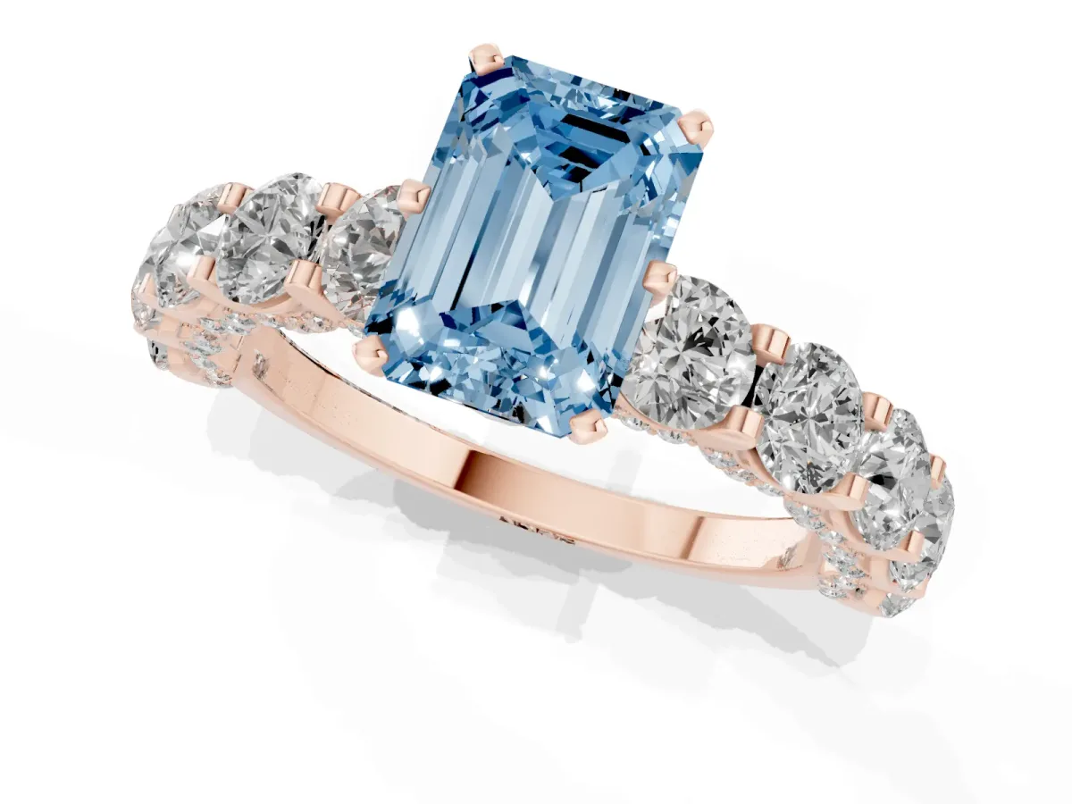 Fancy Blue Emerald Cut Diamond Side Stone Engagement Ring with Four-Prong Setting Rose gold