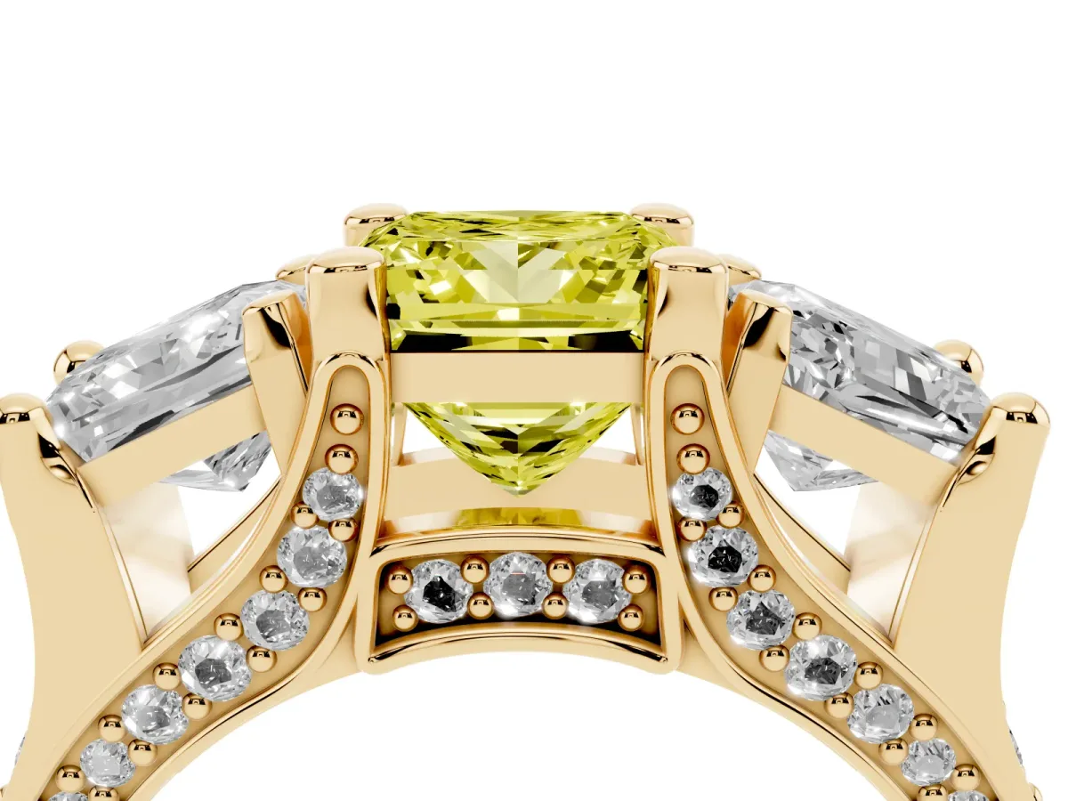 Fancy Yellow Princess Cut Diamond Three-Stone Ring with Channel Set Band and Four-Prong Setting Yellow gold
