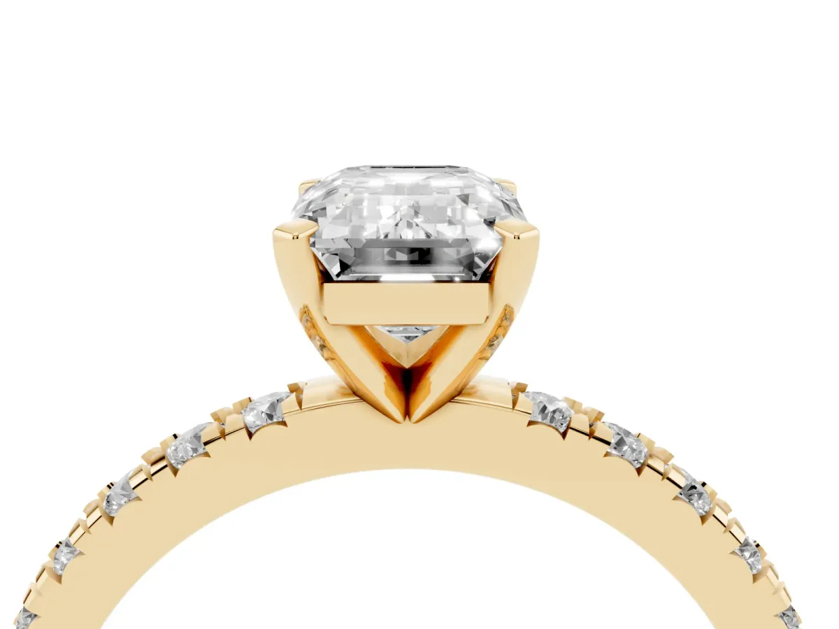 Emerald Cut Diamond Pavé Band Solitaire with Four-Prong Setting Yellow gold