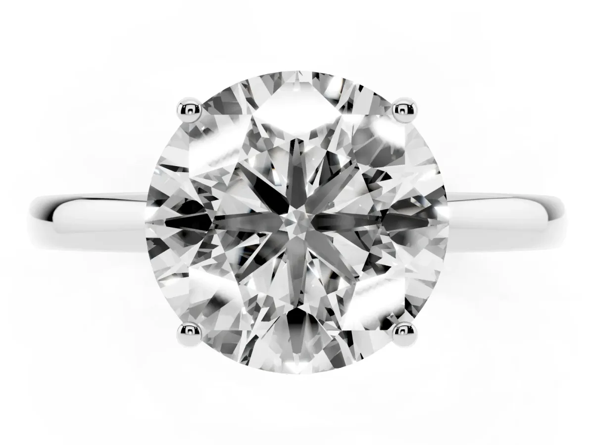 Round Cut Solitaire Diamond Ring with Prong Setting and Plain Band Platinum