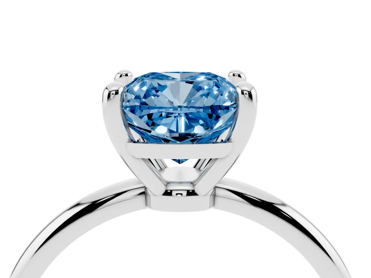 Fancy Blue Cushion Cut Solitaire Diamond Ring with 4-Prong Setting on a Classic Band Silver