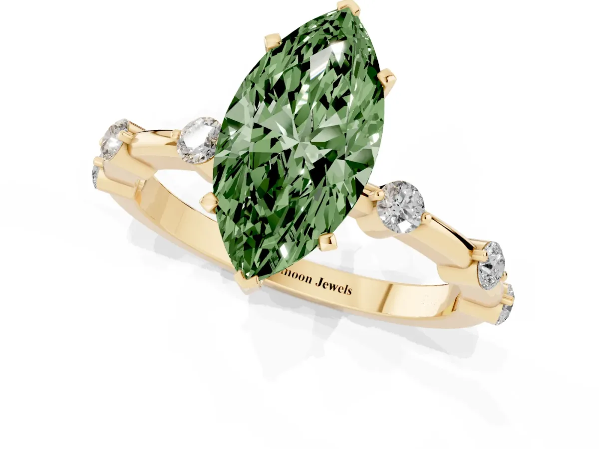 Fancy Green Marquise Cut Solitaire Diamond Ring with Bezel Set Side Stones and Prong Setting Yellow gold