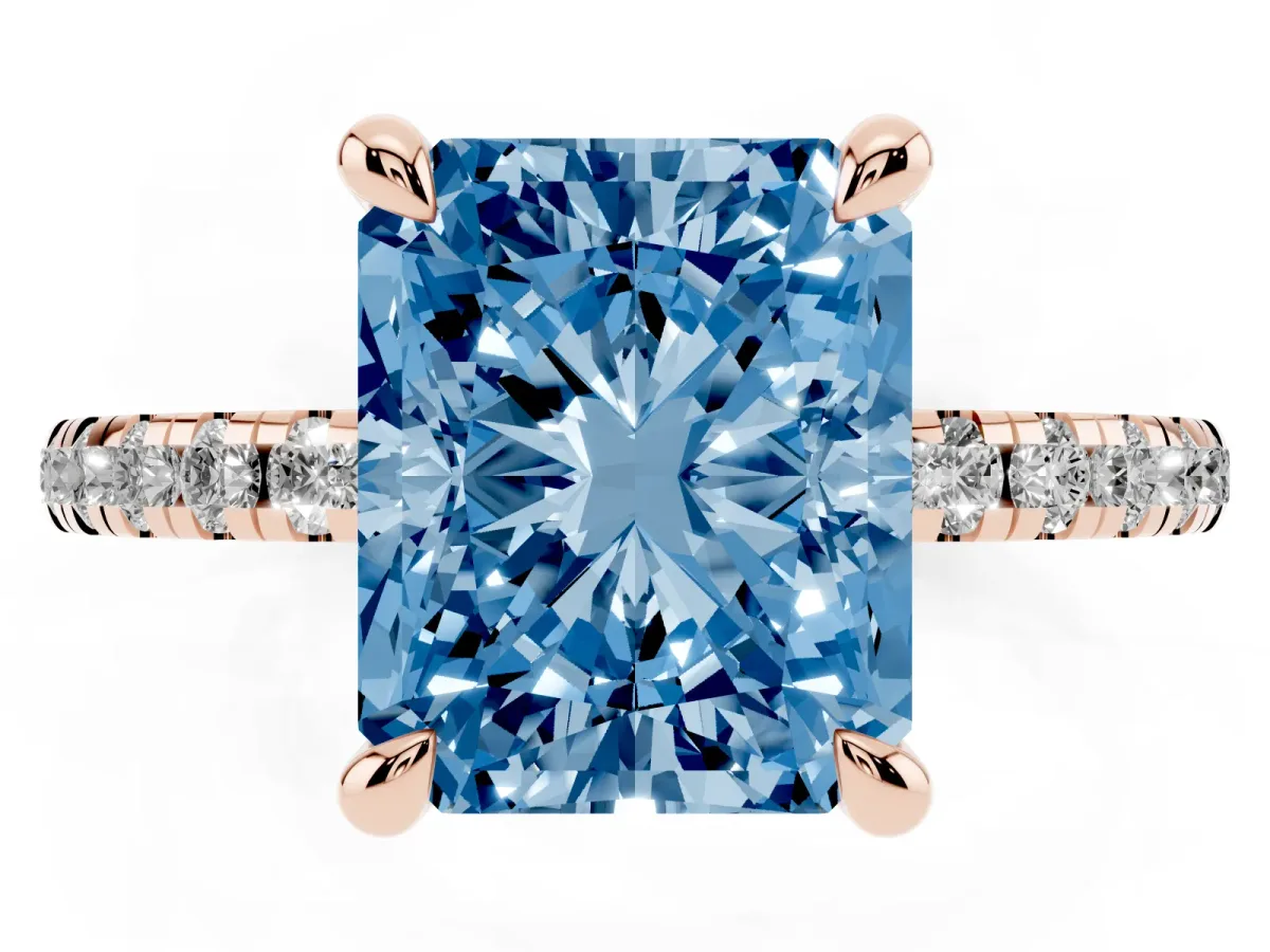 Fancy Blue Radiant Cut Diamond Brilliant Solitaire Ring with Pavé Band and Four-Prong Setting Rose gold