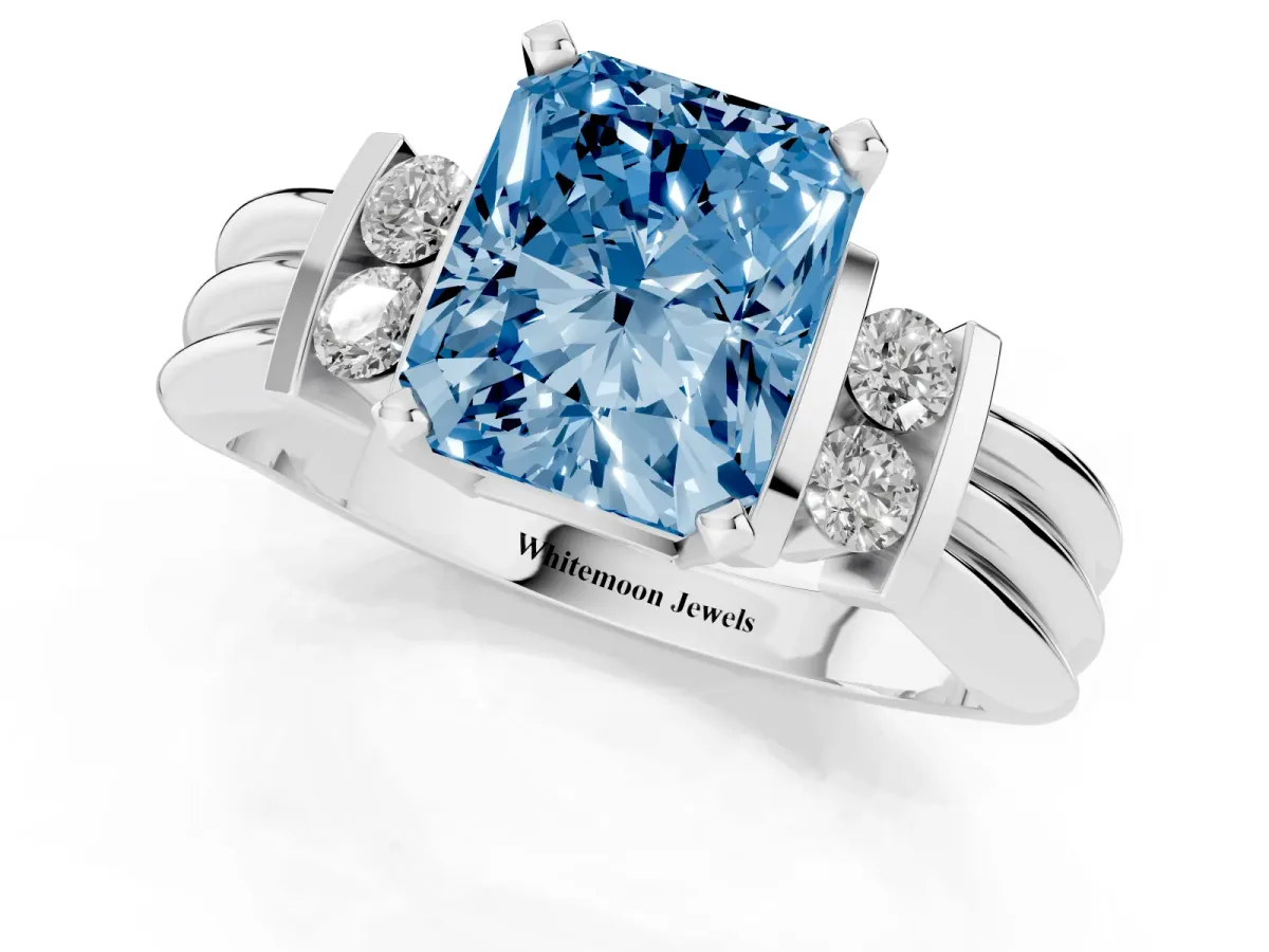 Fancy Blue Radiant Cut Cut Three-Stone Channel Set Ring with Bar Prongs Silver