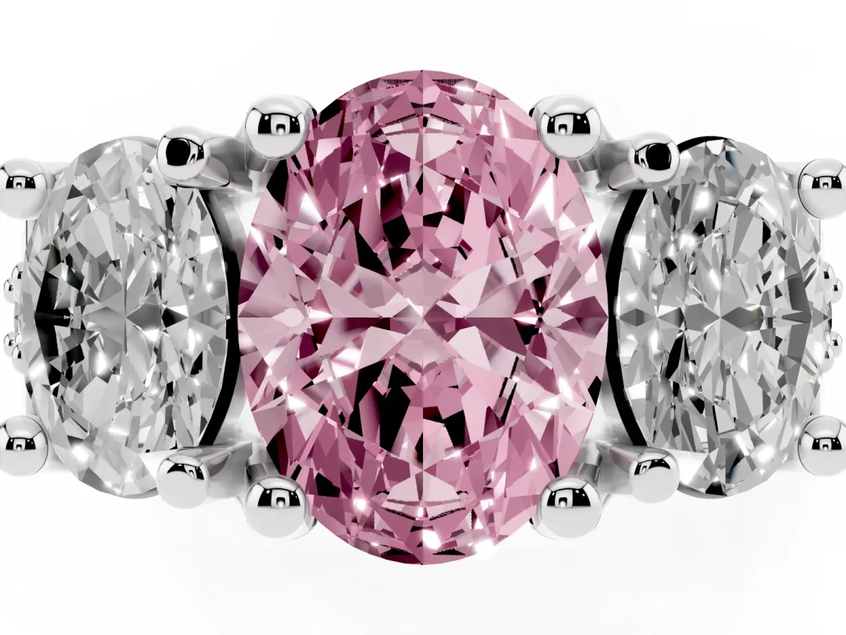 Fancy Pink Oval Cut Diamond Three-Stone Ring with Channel Set Band and Four-Prong Setting Silver