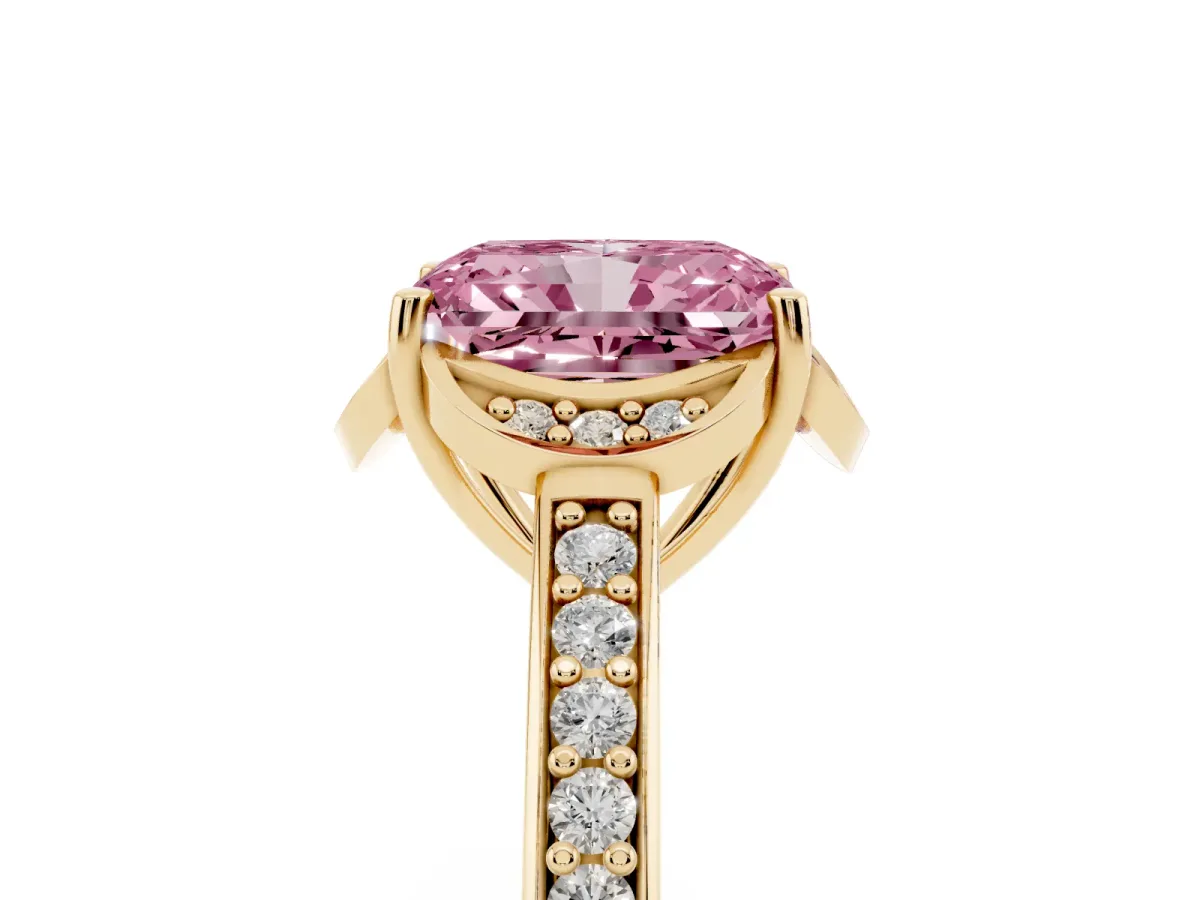 Fancy Pink Radiant Cut Cut Halo Diamond Ring with Channel Set Band and Four-Prong Setting Yellow gold