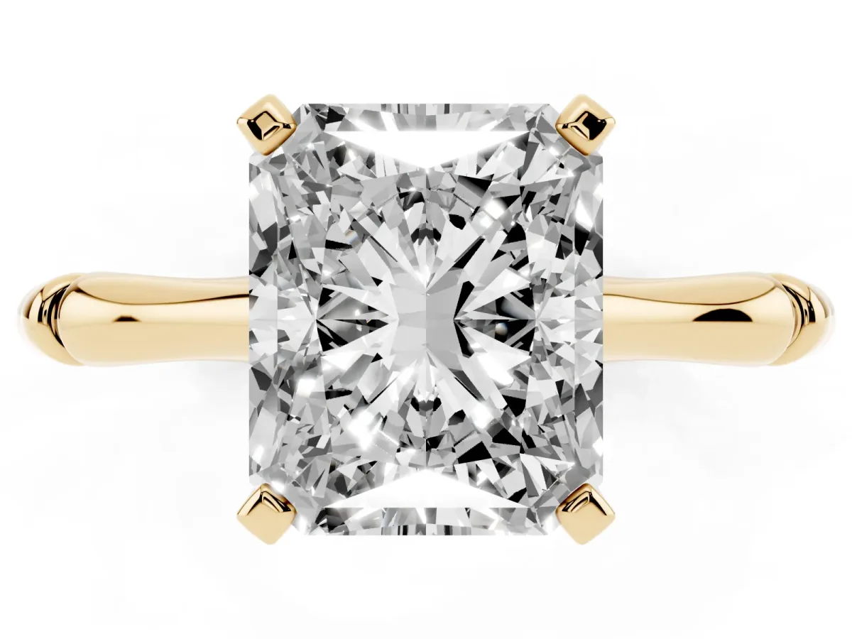 Radiant Cut Solitaire Diamond Ring with Bamboo Band and Four-Prong Setting Yellow gold