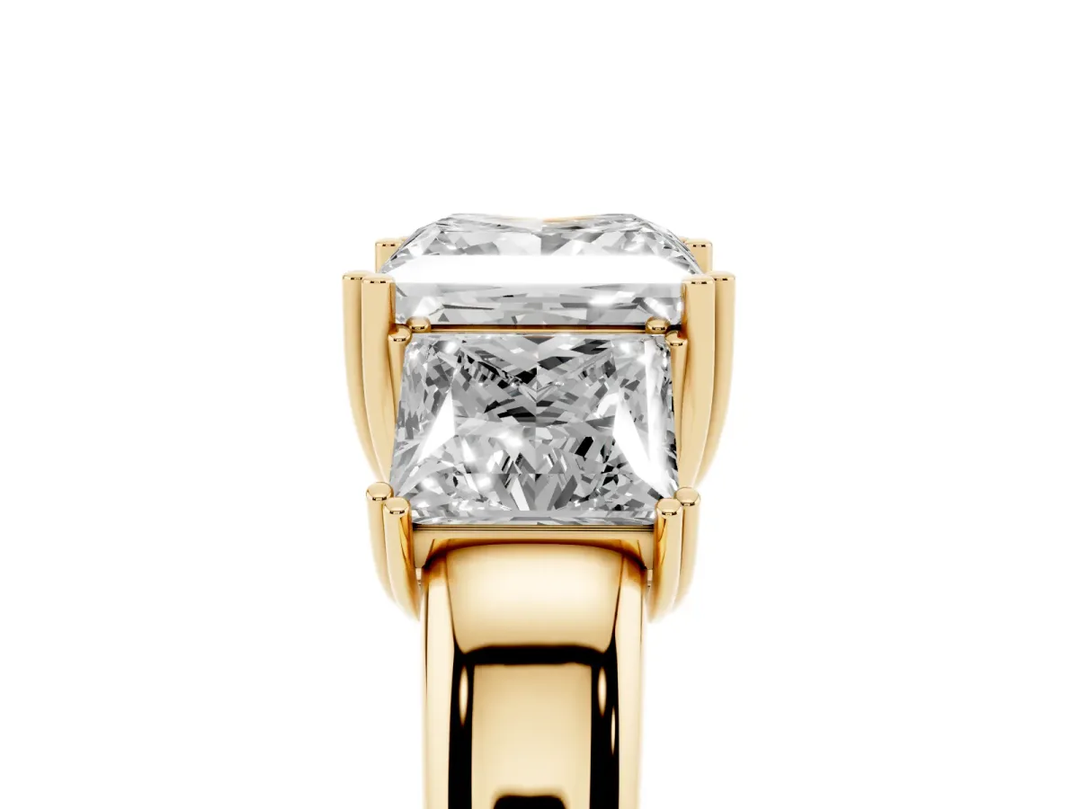 Three-Stone Princess Cut Cut Diamond Ring with Channel Set Band and Four-Prong Setting Yellow gold