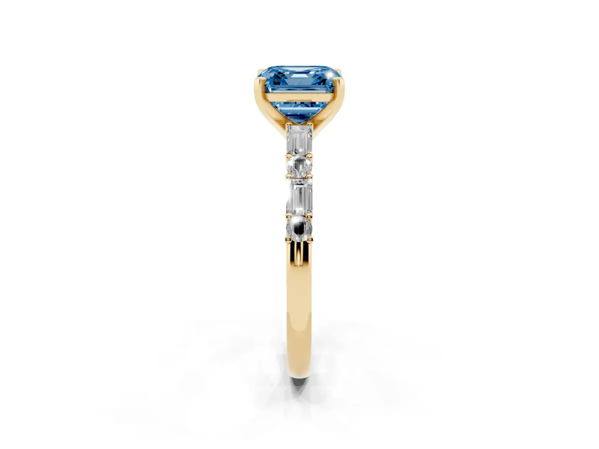Fancy Blue Asscher Cut Diamond Solitaire with Side Baguettes and Channel Set Band Yellow gold