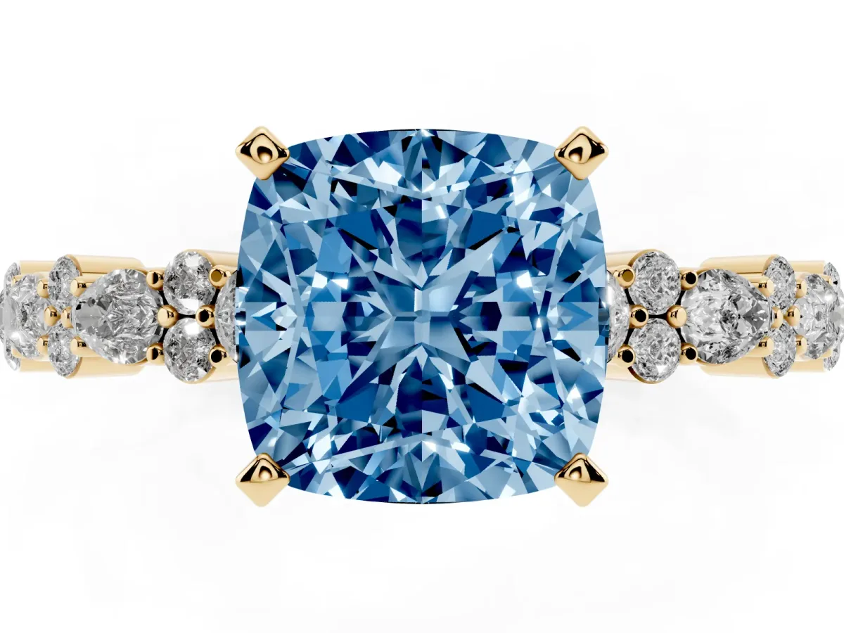 Fancy Blue Cushion Cut Diamond Side Stone Solitaire Ring with Round and Four-Prong Setting Yellow gold