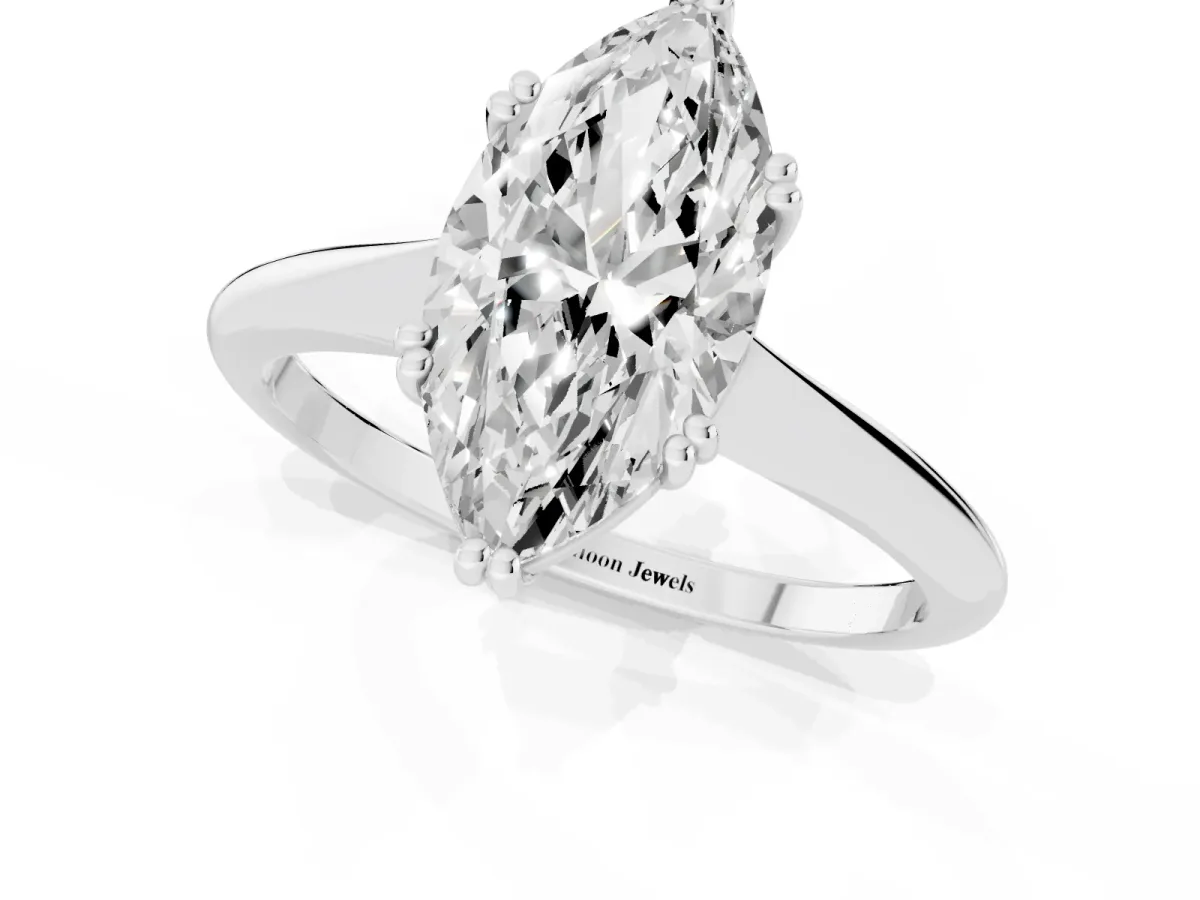 Marquise Cut Solitaire Diamond Ring with Six-Prong Setting and Classic Band Silver