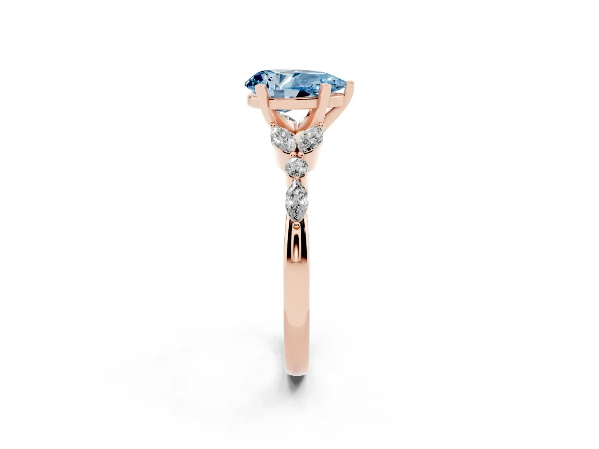 Fancy Blue Pear Cut Diamond Solitaire Ring with Side Stones and Four-Prong Setting Rose gold