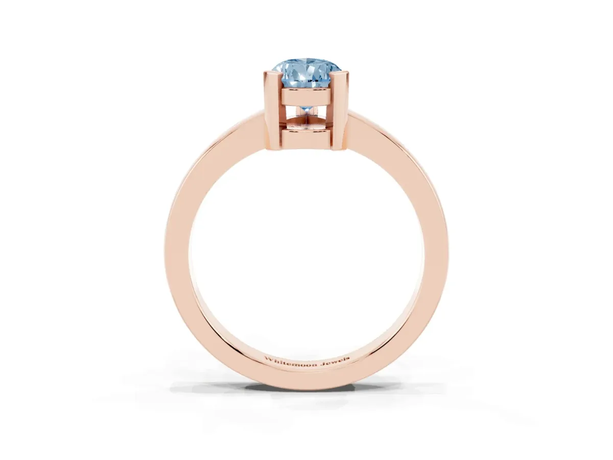 Fancy Blue Pear Cut Cut Solitaire Ring with Four-Prong Setting and Classic Band Rose gold