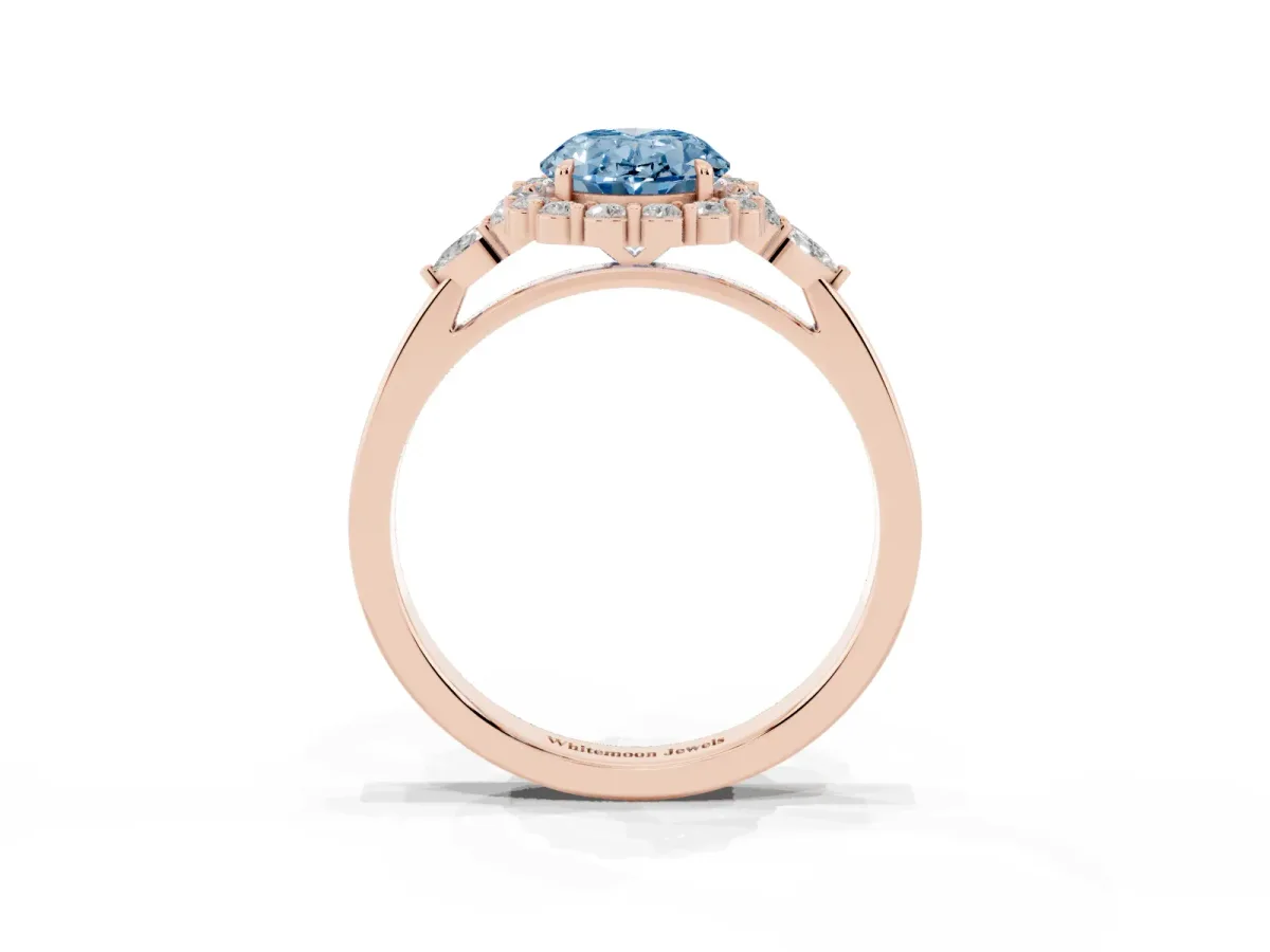 Fancy Blue Oval Cut Diamond Halo Ring with Pear Side Stones and Prong Setting Rose gold