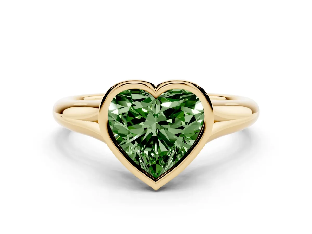 Fancy Green Bezel Set Heart Cut Solitaire Diamond Ring with Smooth Band Yellow gold