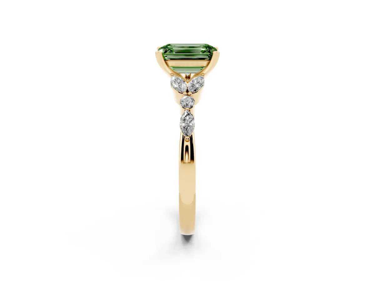 Fancy Green Emerald Cut Diamond Solitaire Ring with Side Stones and Four-Prong Setting Yellow gold