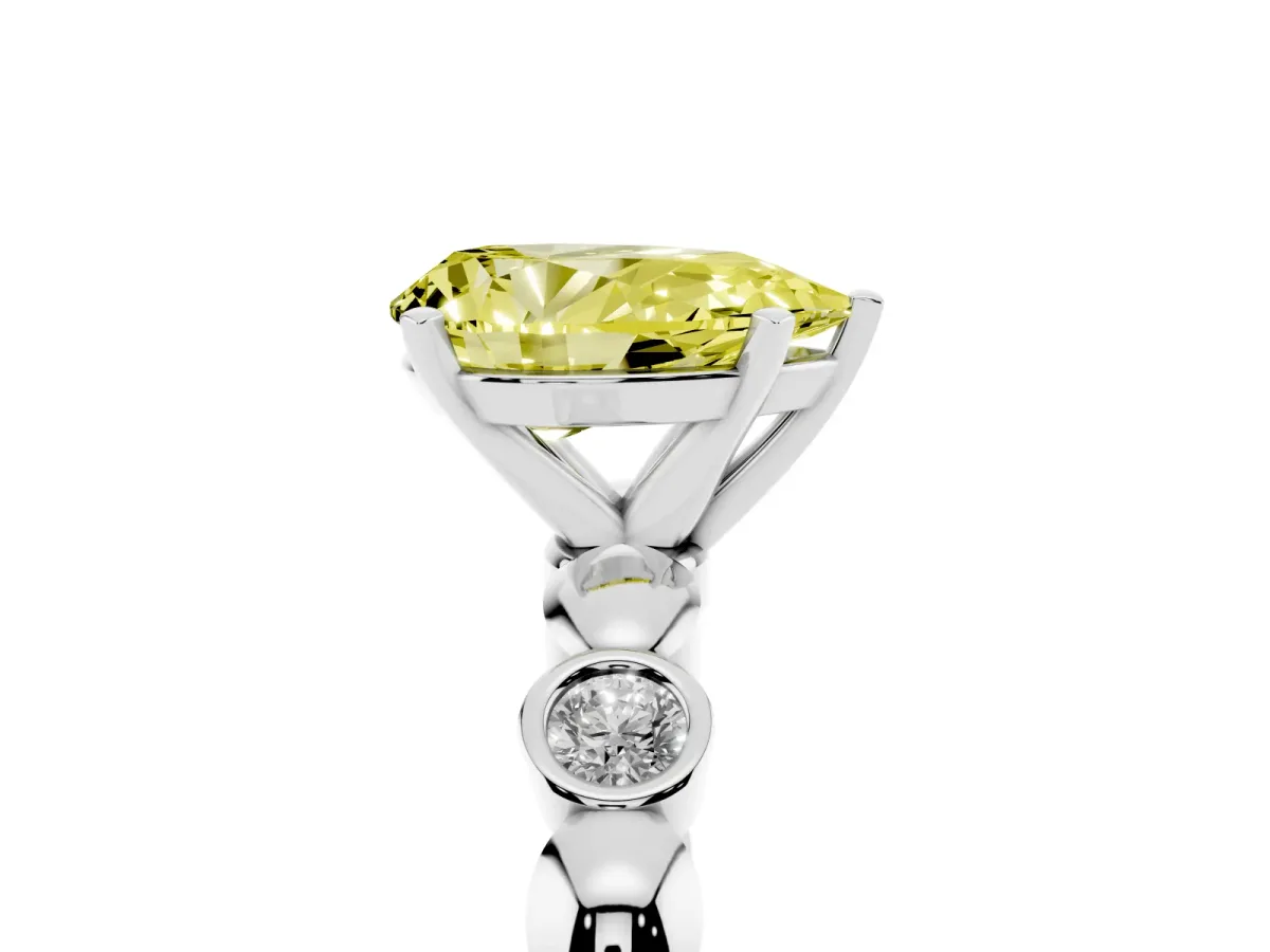 Fancy Yellow Pear Cut Solitaire Bezel-Set Diamond Ring with Beaded Band and Four-Prong Setting Silver