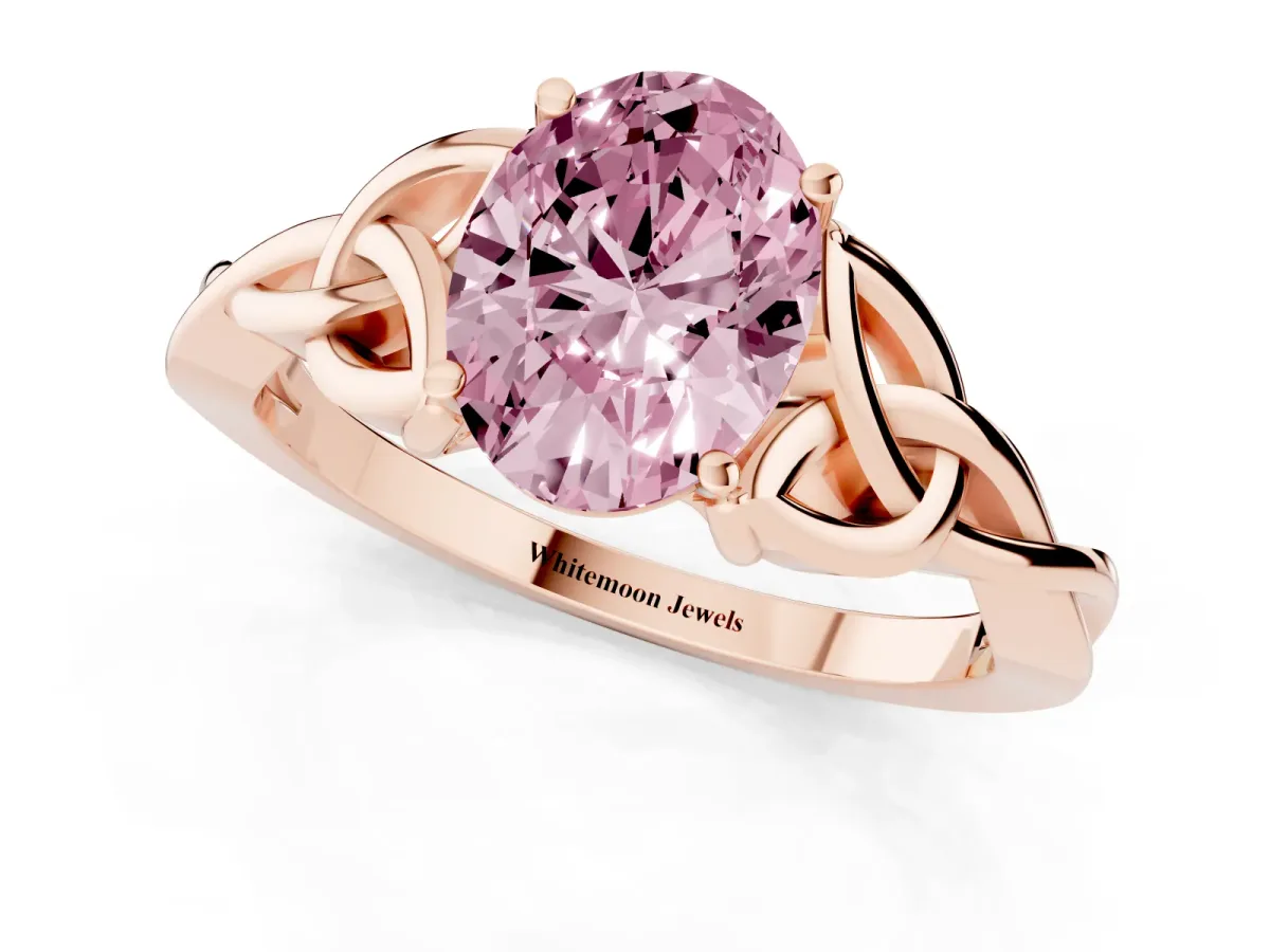 Fancy Pink Oval Cut Diamond Solitaire Engagement Ring with Celtic Knot Band and Four-Prong Setting Rose gold