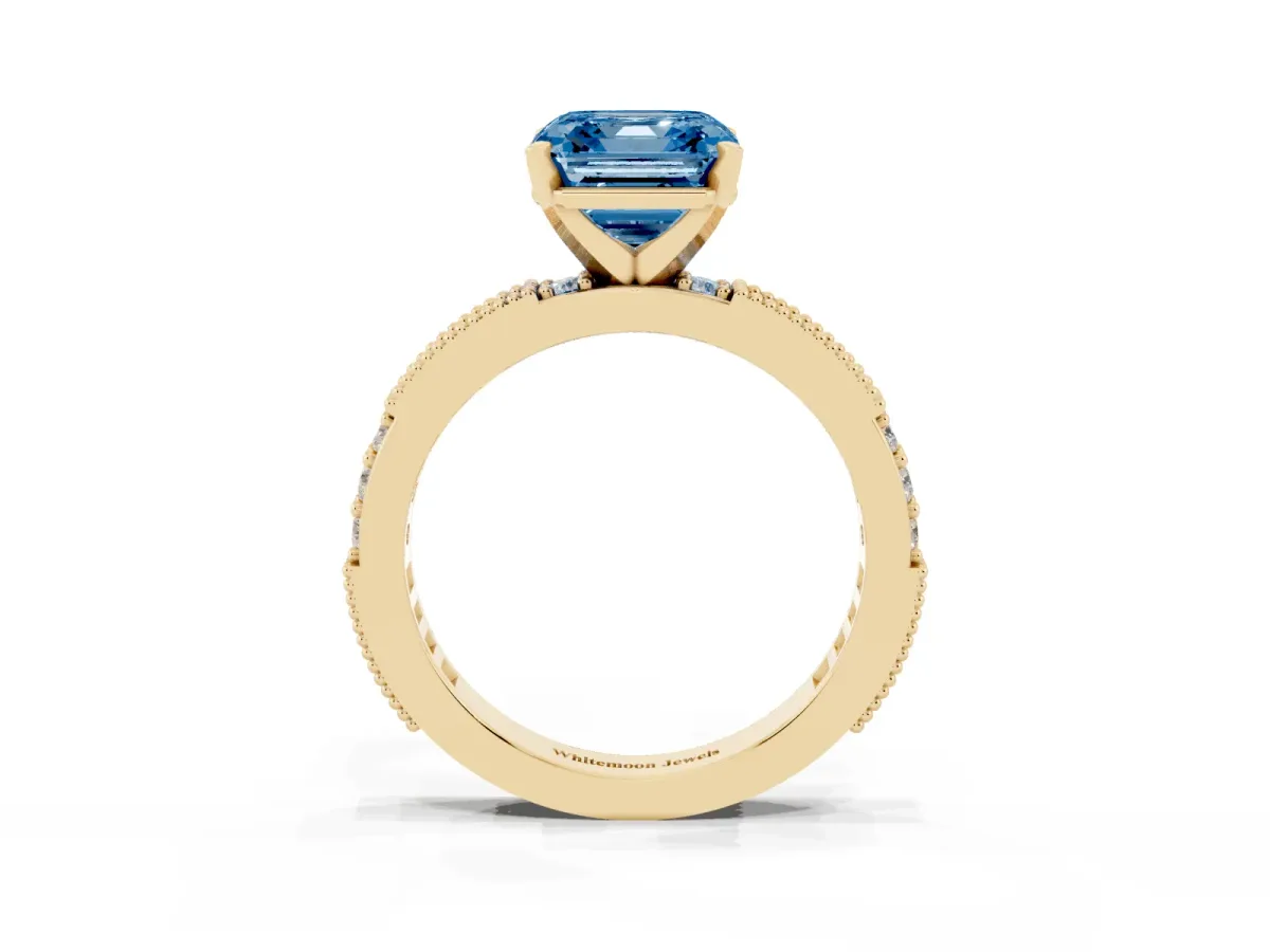 Fancy Blue Asscher Cut Solitaire with Pavé Band and Four-Prong Setting Yellow gold